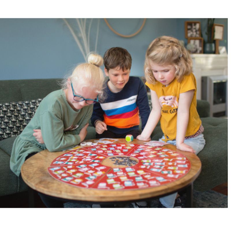 a group of children playing a game on a table.