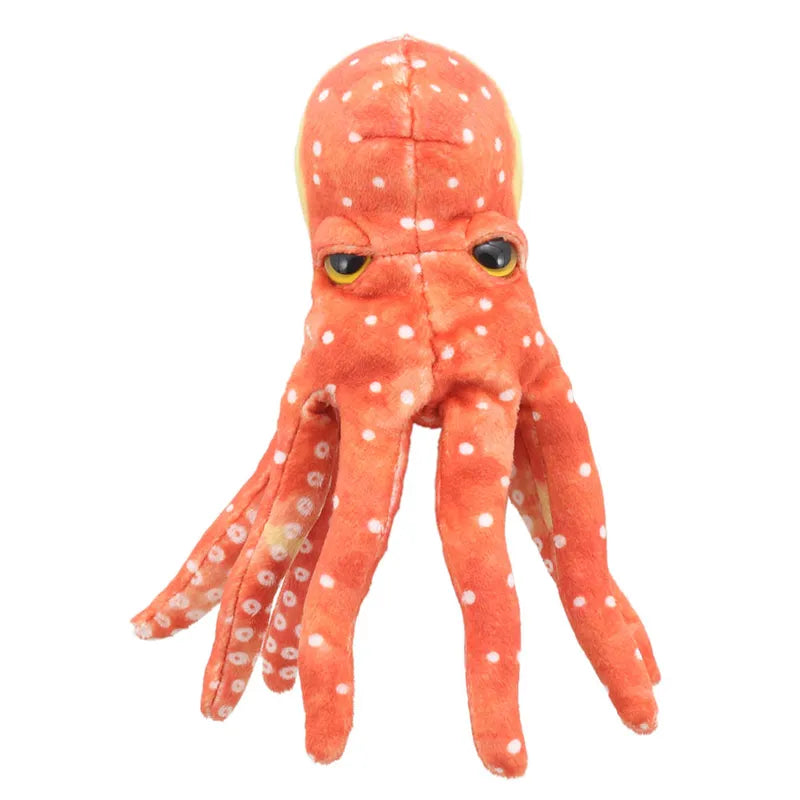 The Puppet Company Finger Puppet Octopus, designed as a plush orange octopus with white spots and a grumpy face, is perfect for storytelling adventures. Its soft, cuddly texture brings tales to life with vibrant experiences.