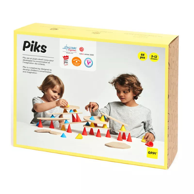 Two children playing with the Piks Construction Big Kit – 64 pieces in a box.