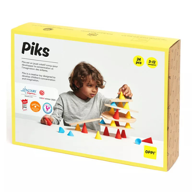 a child playing with a Piks Construction Small Kit.