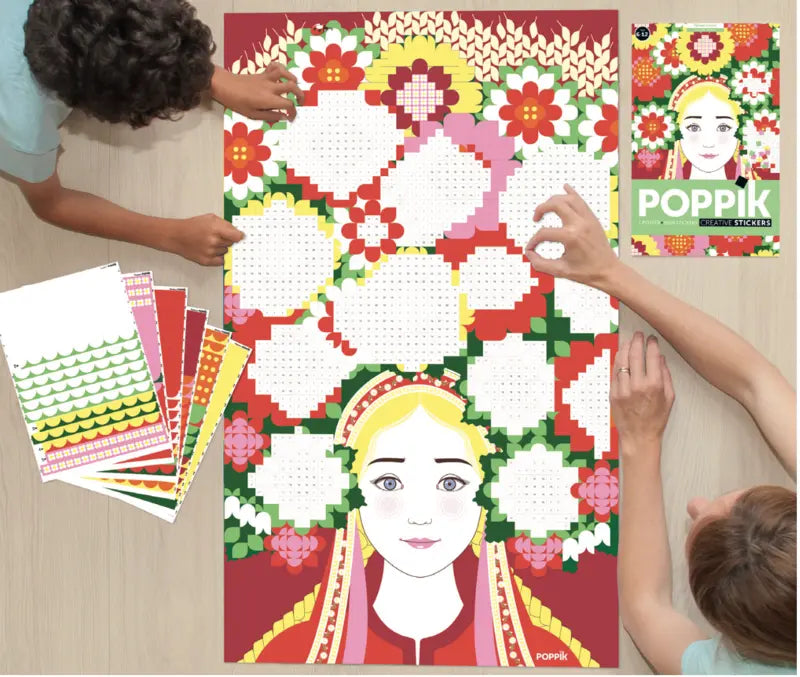 Two children create a colorful mosaic with the Poppik Creative Sticker Poster – Flower Crown. Repositionable stickers and the Poppik box are on the table as they decorate a vibrant poster featuring a girl with a flower crown.