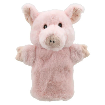 The ECO Puppet Buddies Pig Hand Puppet is a soft, pink farm animal toy featuring floppy ears, a detailed snout, and small, dark eyes. Its plush and fluffy body has front hooves slightly extended forward as if ready for play or storytelling.