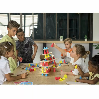 A group of children engaging in a construction game with building blocks at a table, using the Piks Construction Education Kit.