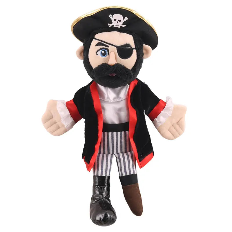 The Puppet Company Hand Puppet Pirate features a plush design with a black skull hat, eye patch, black beard, red and black coat, striped pants, and a peg-leg boot—ideal for vocabulary-building and imaginative play.