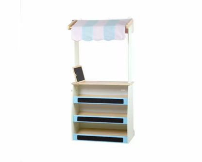 A Tidlo Playshop and Puppet Theatre with a striped awning.