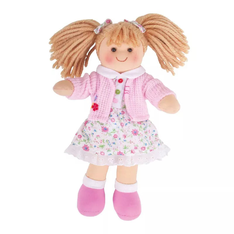 A Bigjigs Poppy Doll Small with blonde hair wearing a dress and pink shoes.