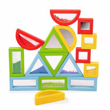 A colorful wooden Rainbow Sensory Shapes set with different shapes and sizes.