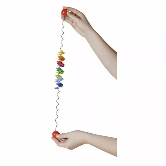 a hand holding a Rainbow Spiral.