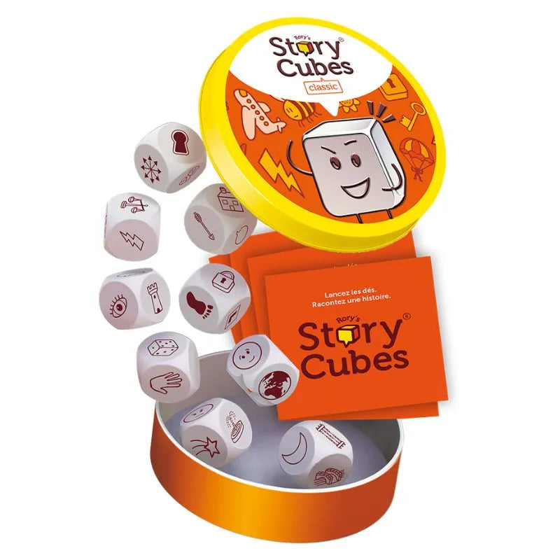 A set of Rory's Story Cube Classic in an open box, displaying nine dice with various icons on each face, including a bee, a flashlight, and a question mark. The packaging is vibrant with