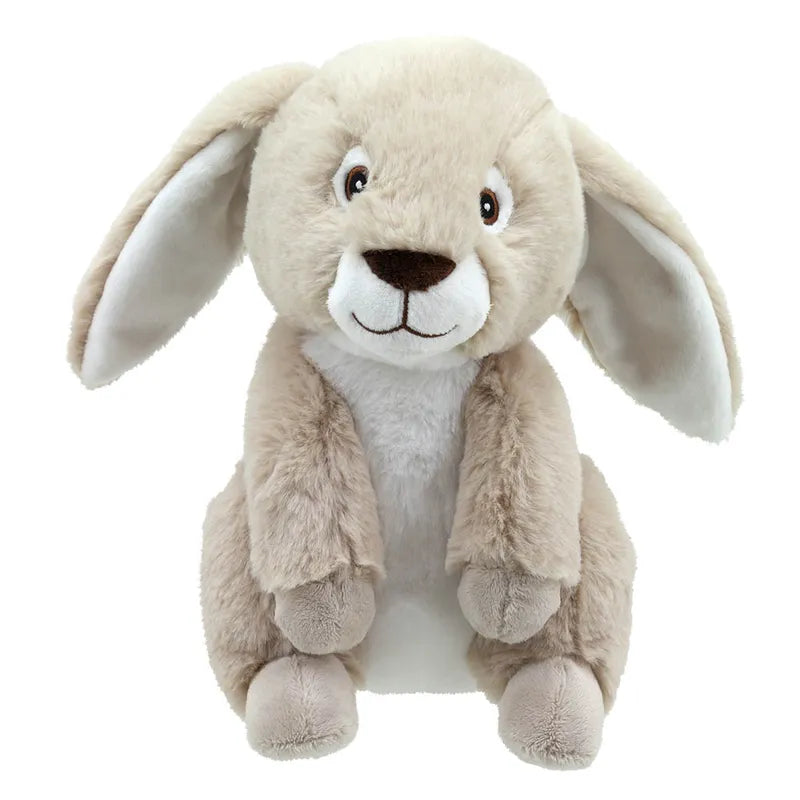 A beige plush bunny named Rosie the Rabbit, part of the Wilberry ECO Cuddlies collection, features long floppy ears, a white belly, and an embroidered smile. Made from recycled materials for eco-friendly cuddles, she sits against a plain background.