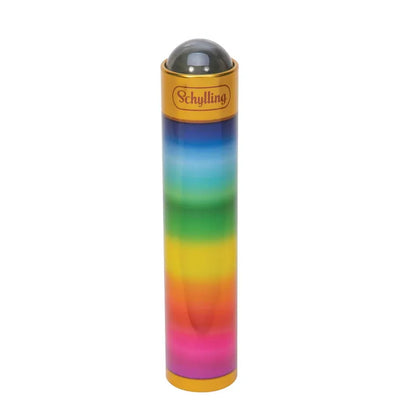 The Schylling Marblescope, a colorful illusion wand, has a cylindrical shape with a rainbow gradient from top to bottom. It features a small, translucent dome on the top and displays the brand name "Schylling" near the top in black text on a gold background.