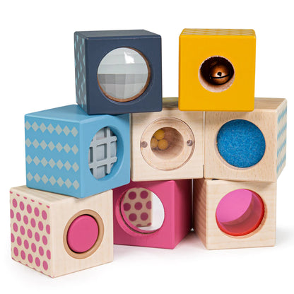 A stack of Bigjigs Sensory Blocks with different shapes and sizes.