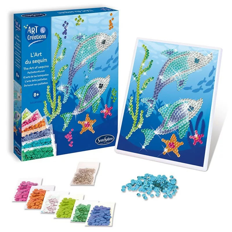 A box with a Sentosphere Sequin Art Dolphin kit and a box of fish.