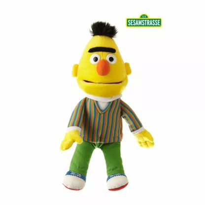 Sesame Street Bert Hand Puppet with yellow head, stripy top and green trousers.