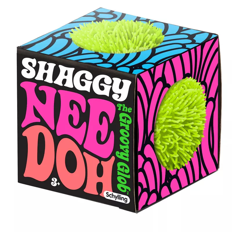 A colorful Shaggy NeeDoh box featuring 'Nee Doh the Groovy Glob' with a vibrant psychedelic design and two squishy, textured anxiety relievers visible through cut-out windows.