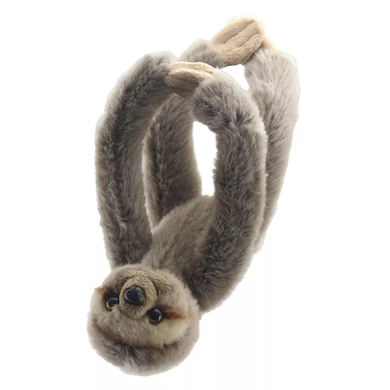 A Sloth Canopy Climber, named Sloth Canopy Climber, hanging upside down with a cute expression on its face.