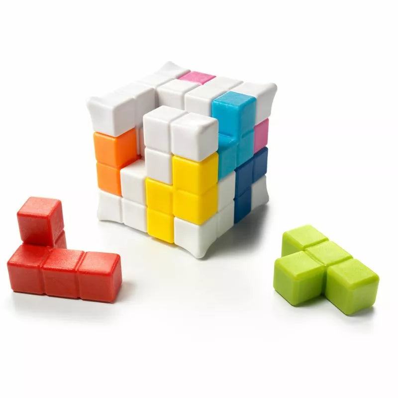 A vibrant puzzle game featuring the SmartGames Plug & Play Puzzler, a set of colorful cubes on a white surface.