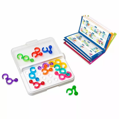 A set of colorful rings and the SmartGames IQ Link, a book that offers a brainteasing STEM game to enhance logic skills.