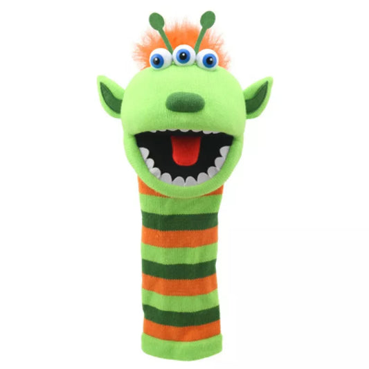 A colourful Sock Puppet named Sockette Puppet Narg It’s knitted body is orange, dark green and light green. He has amouth ful of teeth!It has big expressive eyes and is mouth moving.
