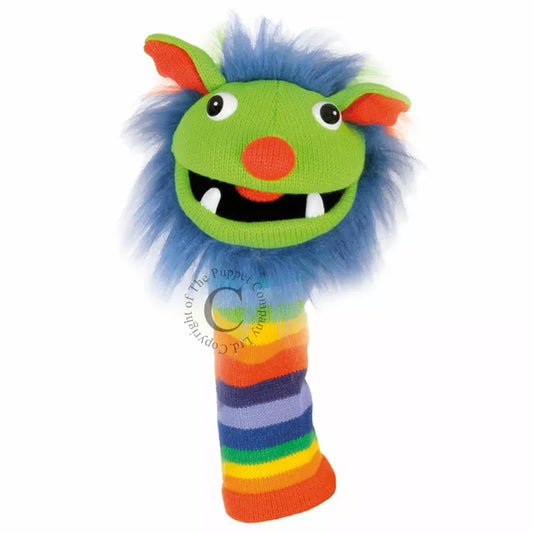 A colourful Sock Puppet named Sockette Puppet Rainbow It’s knitted body is green, yellow, purple and orange.It has big expressive eyes and is mouth moving.