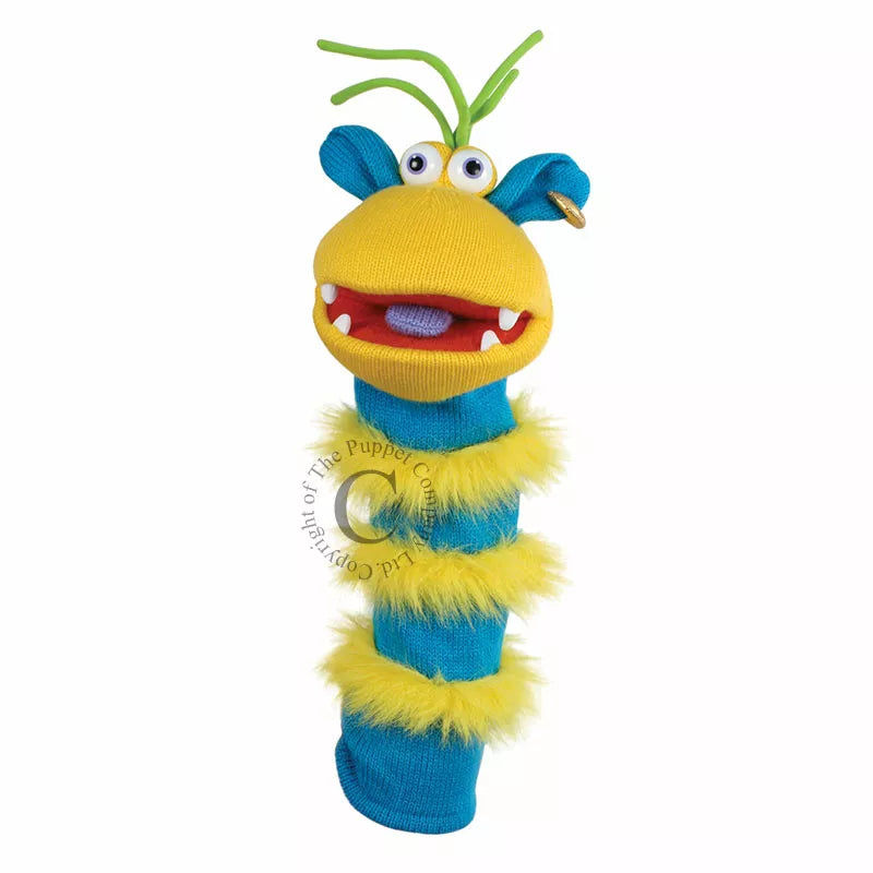 A colourful Sock Puppet named Sockette Puppet Ringo It’s knitted body is yellow and blue. It has big expressive eyes and is mouth moving.