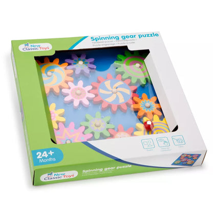 a box with a New Classic Toys Spinning Gear Puzzle inside of it.