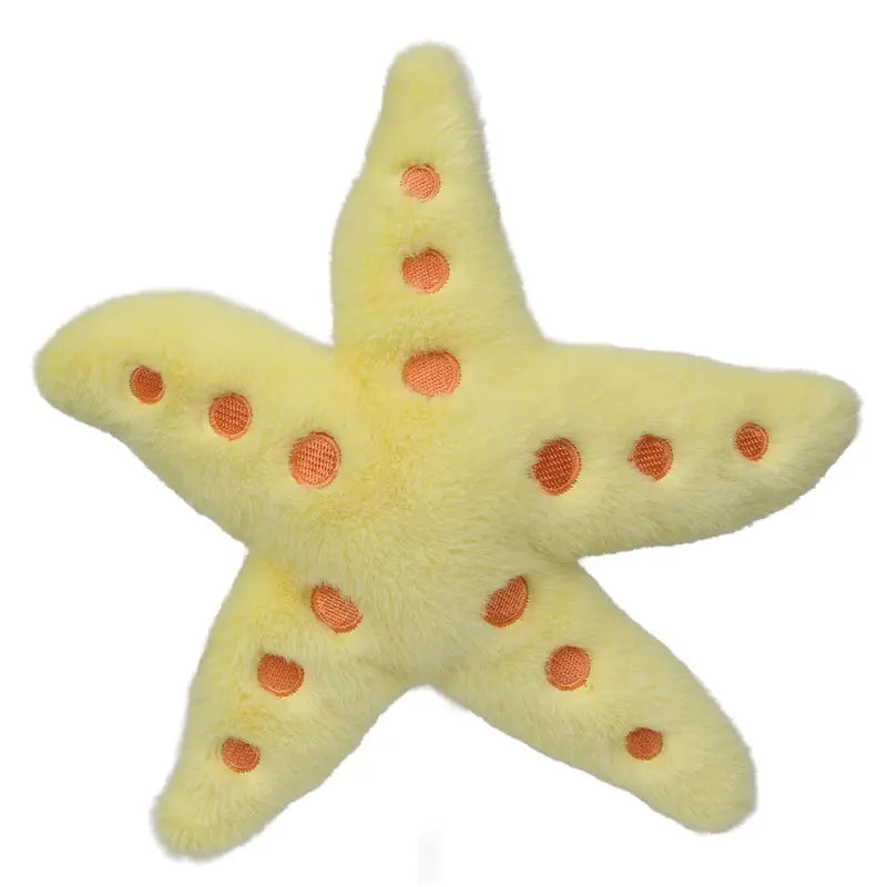 The Wilberry Water Wonders Starfish Soft Toy is a soft, yellow plush with five arms and orange circular spots, shown on a white background. Perfect for cuddling and imaginative play, this adorable sea creature will delight any child.