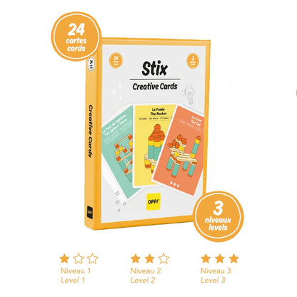 Box of "Stix Construction Creative Cards" with 24 cut cards for various skill levels, designed for stacking, displayed against a white background.