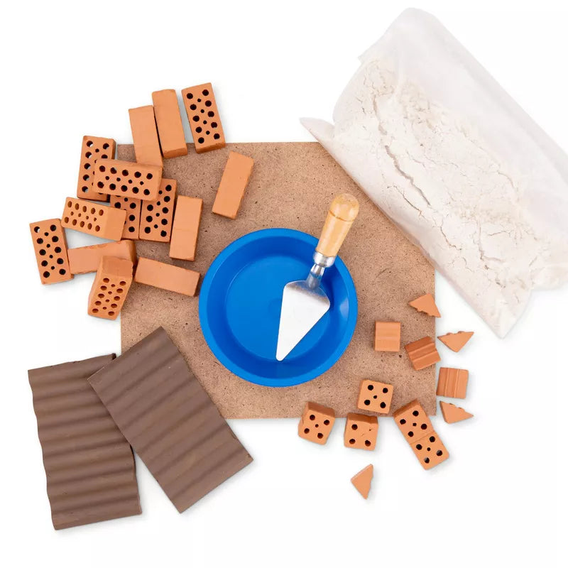 A set of Teifoc Brick Construction Small House, a knife and a spatula designed for construction play.