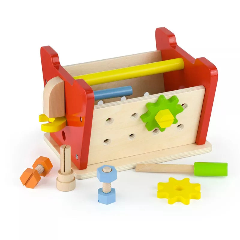 A New Classic Toys Table Top Workbench with blocks and a hammer.