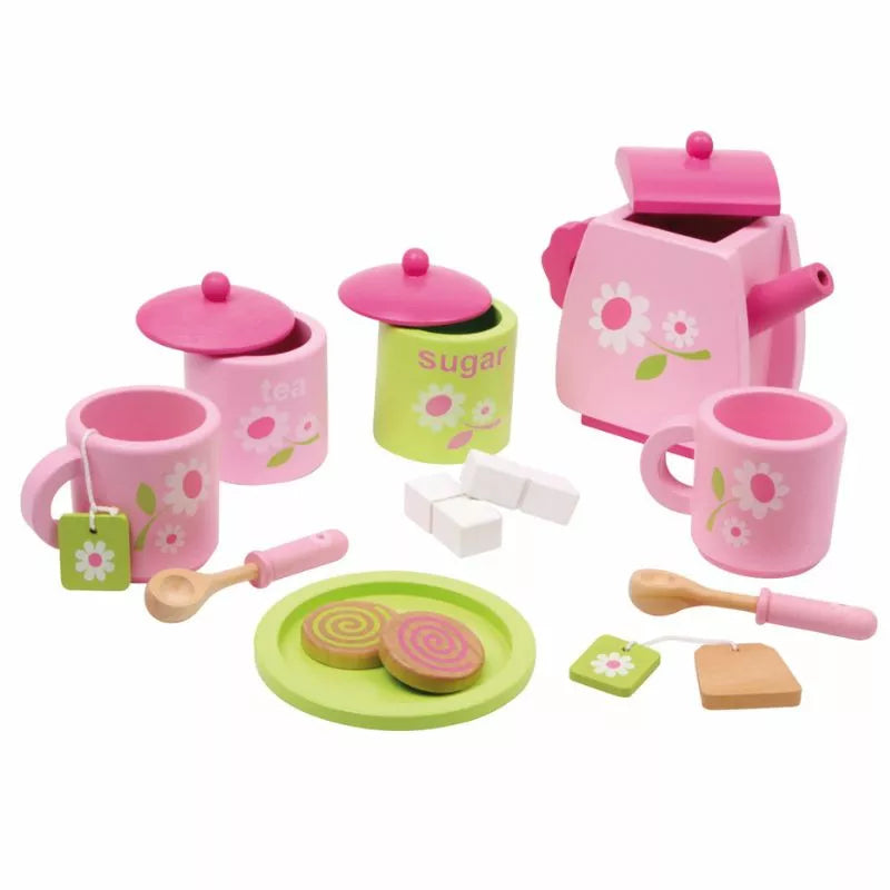 A tea set with kettle and pink and green accessories.