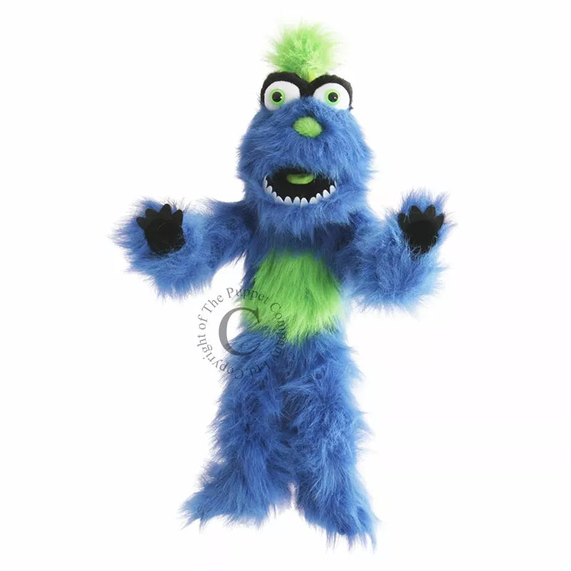 The Puppet Company Blue Monster a blue and green monster stuffed animal.