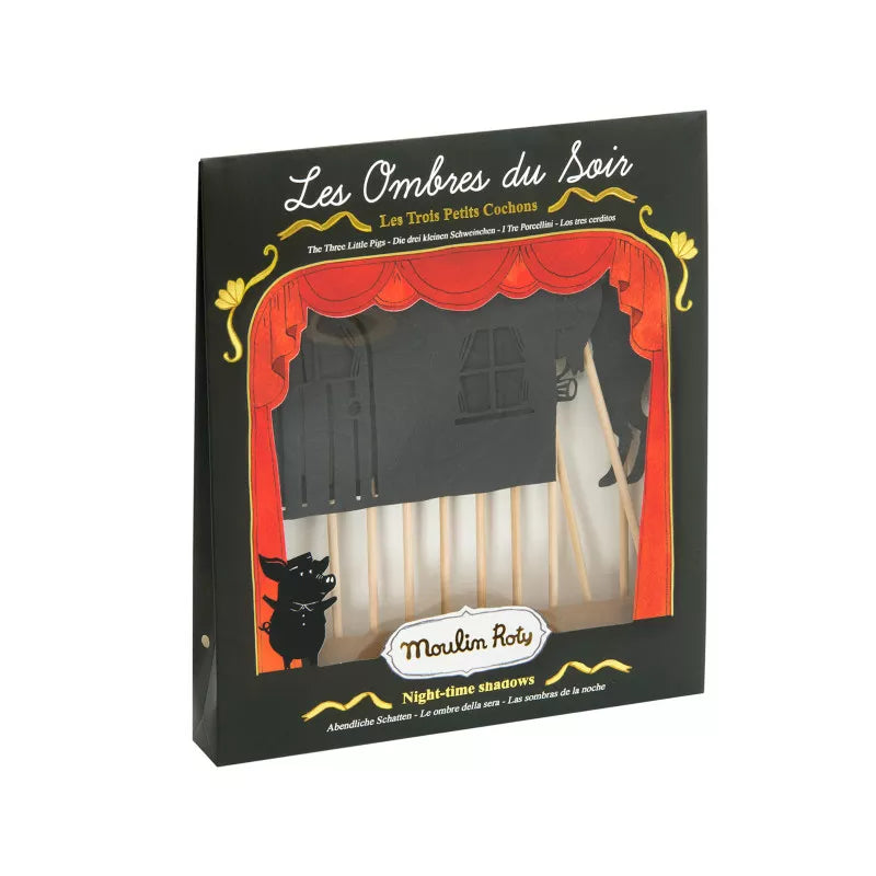 A Moulin Roty Three Little Pigs Shadows Puppet sitting on top of a stage.