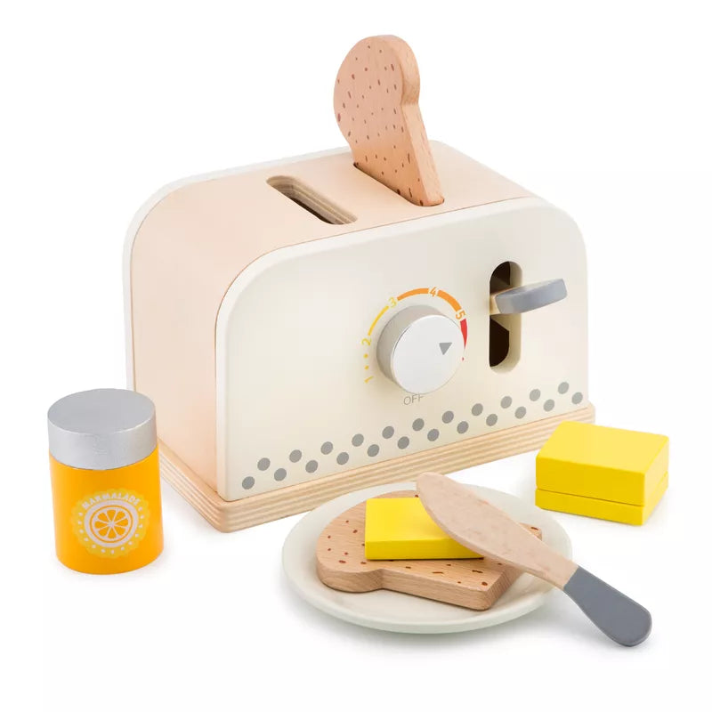 The New Classic Toys Toaster Set White with a slice of bread next to it.