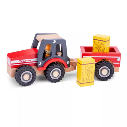 A wooden New Classic Toys Wooden Tractor with Trailer and Hay Stacks.