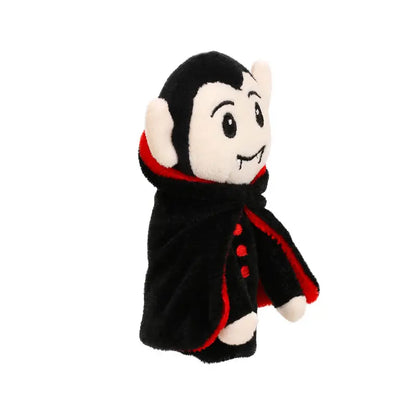 Vampire Finger Puppet Decoration featuring a cartoon vampire with a black cape, red trim, white fangs, and a cheerful expression—ideal for bringing some spooky fun to your Halloween decorations. Displayed against a plain white background.