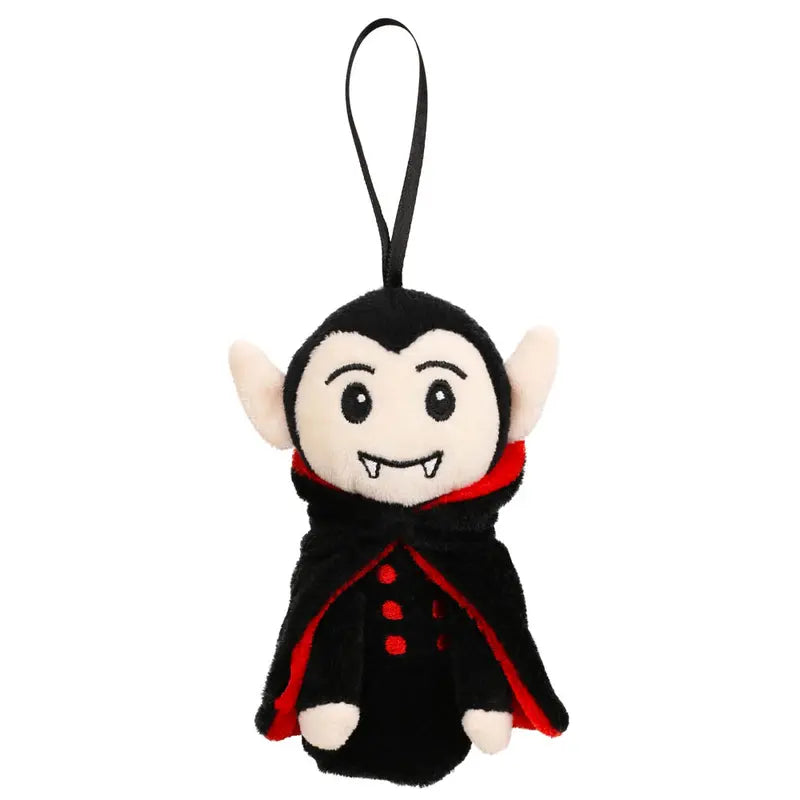 The Vampire Finger Puppet Decoration is a plush toy shaped like a cartoon vampire, featuring a black cape, red-lined collar, white fangs, and a black hanging loop on top—perfect for spooky fun as a Halloween finger puppet or as part of your festive Halloween decorations.