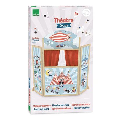 A box of the Vilac Circus Theater playset for children aged 3 years and up. The colorful box features circus-themed illustrations of a tent, performers, and various acts. Text on the box is written in multiple languages, and the playset is crafted from high-quality wood, making it a delightful wooden toy.