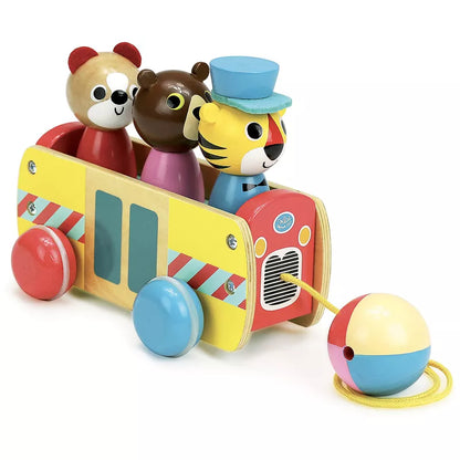 a Vilac Coach Pull along toy bus with a tiger, a bear and a ball.