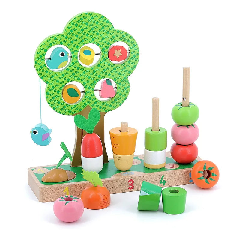 The Vilac I Learn Counting Vegetables is a vibrant wooden toy set ideal for children aged 18 months and older. It features a green tree adorned with bird and fruit shapes, a stackable base with numbered slots, and an assortment of vegetables. The set includes four vertical rods with stacked fruit pieces and carrots neatly positioned in front of the toy.