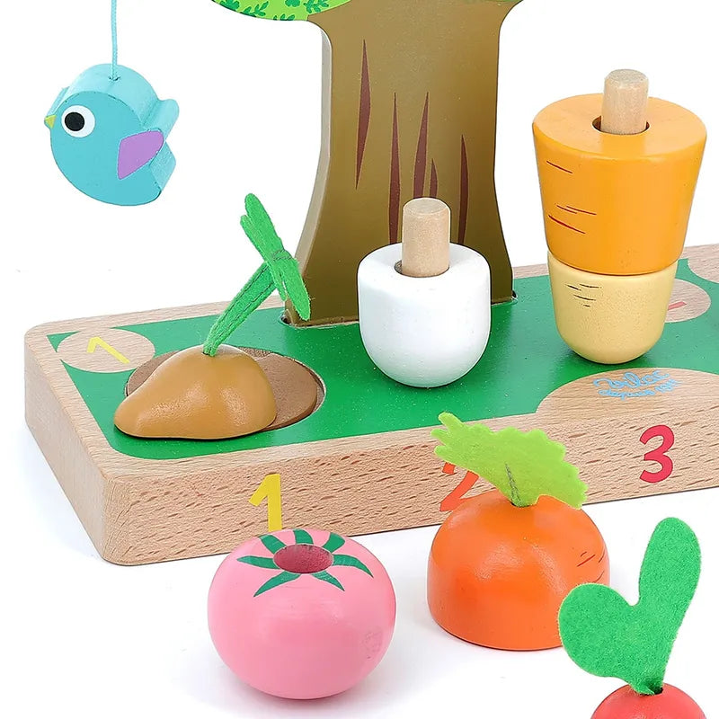 The Vilac I Learn Counting Vegetables is a wooden toy set designed for children 18 months and older to teach numbers and colors. It includes brightly colored vegetables like carrots and radishes that can be inserted into corresponding holes in a wooden base marked with numbers 1 to 3, along with a small blue bird hanging from a tree.