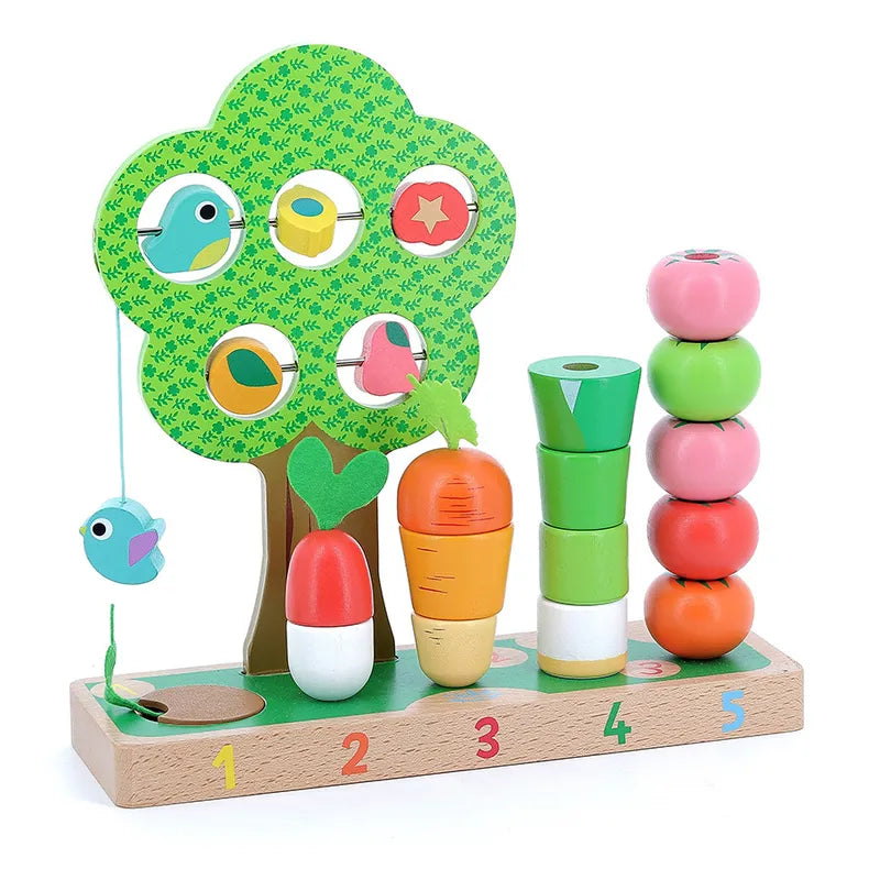 The Vilac I Learn Counting Vegetables is a vibrant, wooden stacking toy set designed for children aged 18 months and older. It features a tree adorned with birds and an apple, as well as numbered sections at the base with stackable parts shaped like carrots, radishes, green vegetables, and tomatoes.