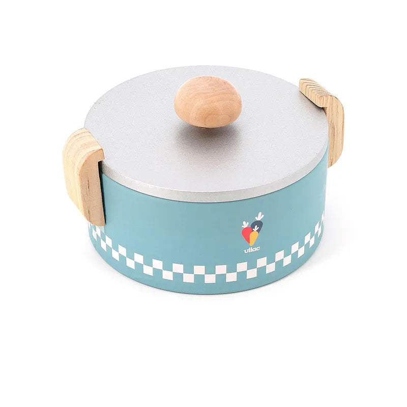 The Vilac Early Learning Cooking Pot is a round, blue cooking pot adorned with a charming white checkered pattern near the bottom. It features wooden handles on the sides and a matching lid with a wooden knob on top. Decorated with small heart and flower designs, this exquisite piece resembles an enchanting wooden toy meant to captivate your senses.