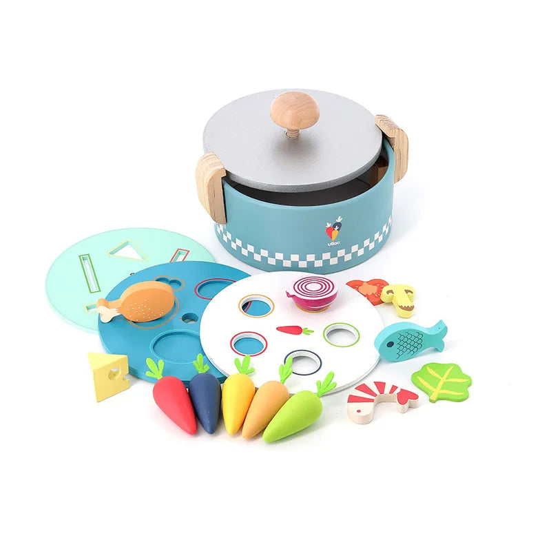 The Vilac Early Learning Cooking Pot is a delightful children's wooden toy set for ages 18 months and up. It features a blue pot with a gray lid and wooden handles, along with charming cut-out shapes such as carrots, a tomato, fish, and geometric pieces. This engaging toy is perfect for shape sorting and imaginative play.