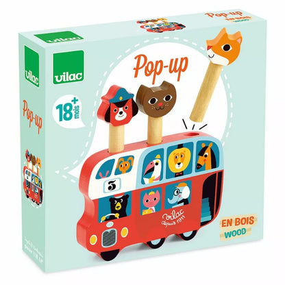 a box with a Vilac Pop-up Bus with animals on it.