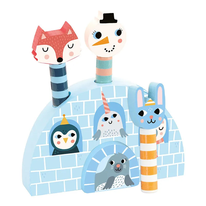 Vilac Pop-Up Iceland is a vibrant wooden toy suitable for children 18 months and older. It features pop-up pegs shaped like a fox, snowman, and rabbit, all standing on a blue igloo-shaped base adorned with illustrations of a penguin, yeti, and seal wearing winter hats.