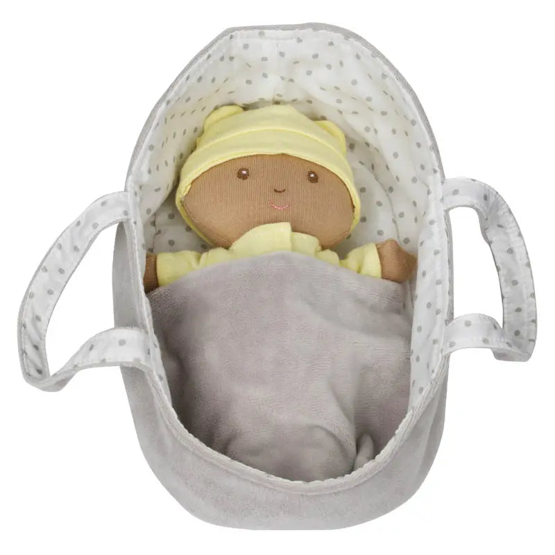 The Wilberry Baby Doll in Yellow Outfit comes with a white and gray polka-dot basket with handles and a light gray blanket—an adorable, soft fabric doll that's the perfect gift for newborns.