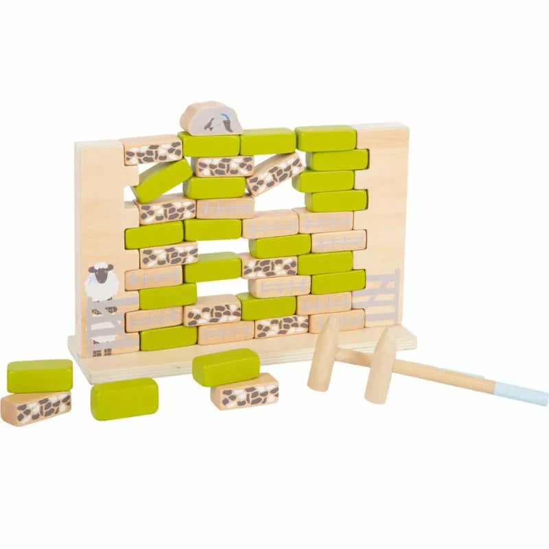 A preschoolers' Wobbly Wall Game "4 Friends" set up and ready to play, featuring animal prints and a pair of tiny mallets for gameplay.