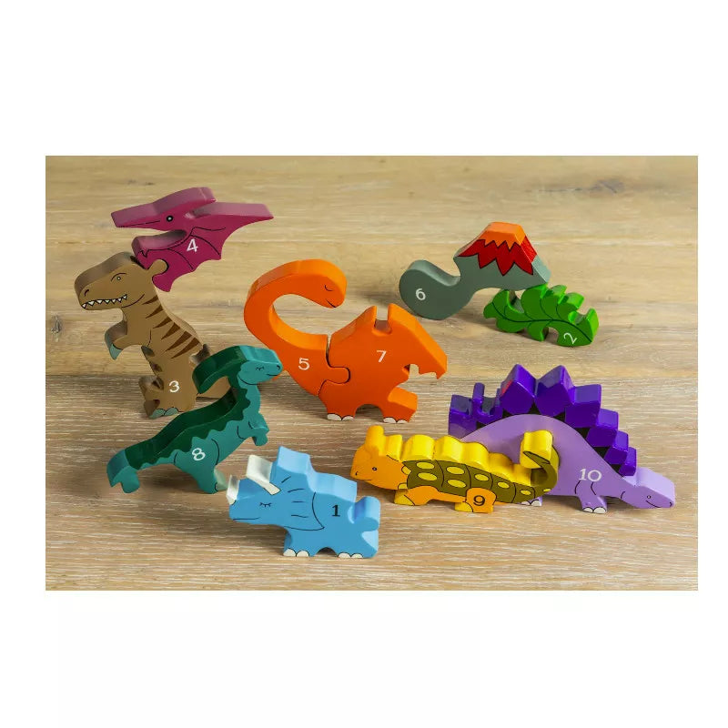 A group of Alphabet Jigsaws Number Row Dino wooden toys on an Alphabet Jigsaws wooden table.