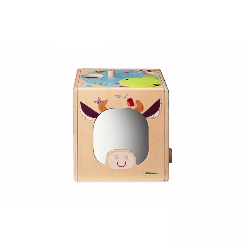 The Lilliputiens Wooden Activity Cube Farm has a mirror on top of it.